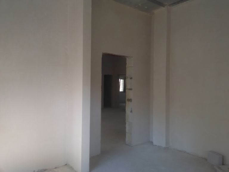 Машинна штукатурка вертикальних і горизонтальних укосів