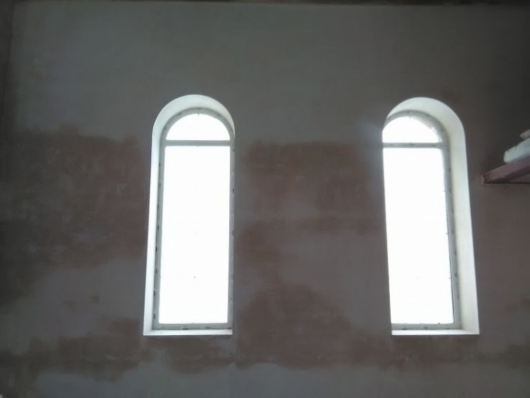 Машинна штукатурка арочних вікон