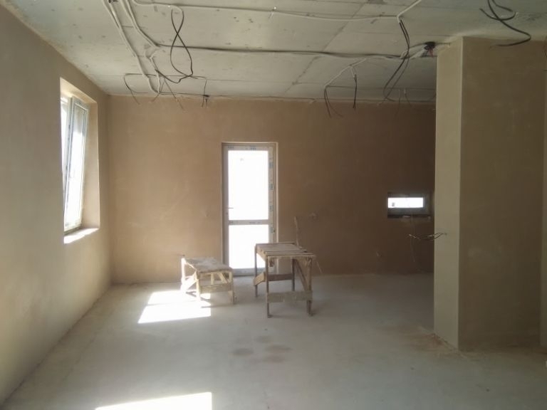 Машинна штукатурка по маякам - рівні стіни по площині та рівню